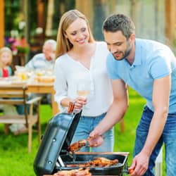 Family enjoying a barbecue.