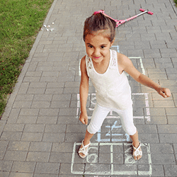 Girl playing outside during spring.