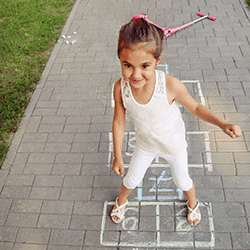 Girl playing outside during spring.